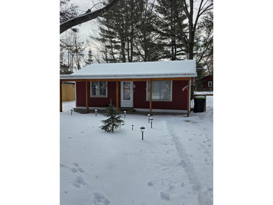Lake St Helen Home For Sale in Saint Helen Michigan