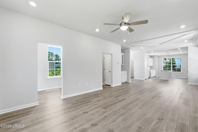 This two-story home includes three bedrooms and two-and-one-half - photo 11