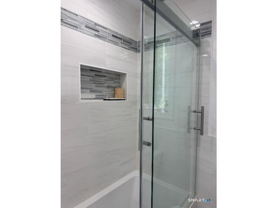 Welcome to 10 Candleview Drive, a beautifully renovated home in - photo 12