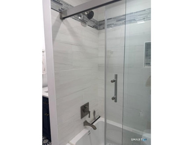 Welcome to 10 Candleview Drive, a beautifully renovated home in - photo 13