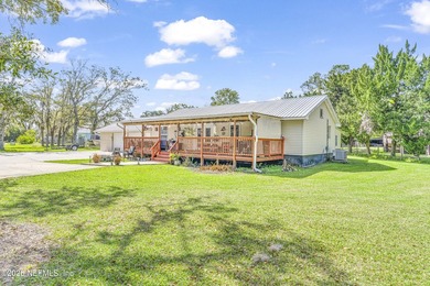 Welcome to this charming sunny ranch-style home set on a - photo 3