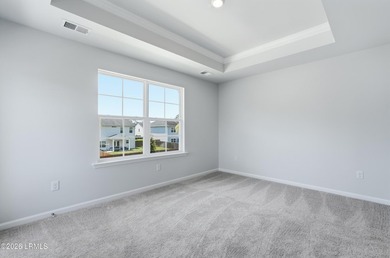 This two-story home includes three bedrooms and two-and-one-half - photo 15