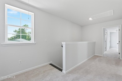 This two-story home includes three bedrooms and two-and-one-half - photo 19