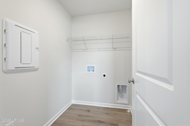 This two-story home includes three bedrooms and two-and-one-half - photo 23