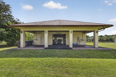 This lovely house sits on 5 aces in the tranquil equestrian - photo 27