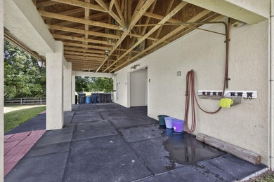 This lovely house sits on 5 aces in the tranquil equestrian - photo 28