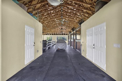 This lovely house sits on 5 aces in the tranquil equestrian - photo 31