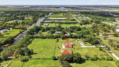 This lovely house sits on 5 aces in the tranquil equestrian - photo 33