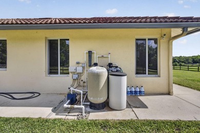 This lovely house sits on 5 aces in the tranquil equestrian - photo 36