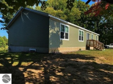 Lake Home For Sale in Buckley, Michigan