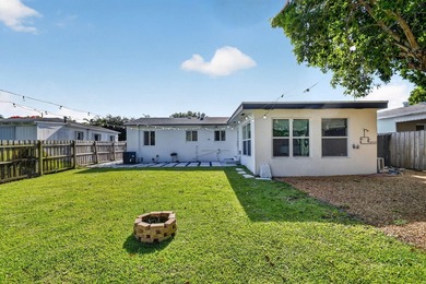 Welcome to this charming single-story residence Great - photo 4