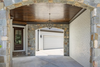 Welcome to this stunning custom estate nestled within the gates - photo 3