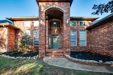 Set on nearly an acre (MOL) in Northwood Lake Estates, this - photo 1