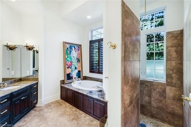 Paradise is redefined at this elevated waterfront estate, where - photo 11
