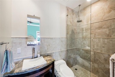 Paradise is redefined at this elevated waterfront estate, where - photo 15