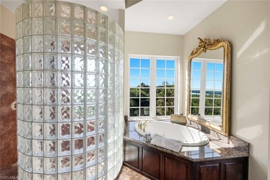 Paradise is redefined at this elevated waterfront estate, where - photo 30
