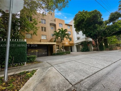 Live in the heart of Coconut Grove in this bright, top floor - photo 1