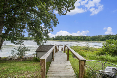 FIXER UPPER WITH A UNIQUE WATERFRONT PROPERTY! - Lake Home For Sale in Marcellus, Michigan