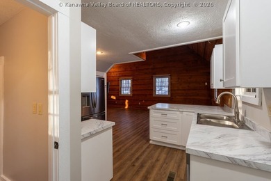 Totally updated throughout, this two-bedroom, two-bath cottage - photo 12
