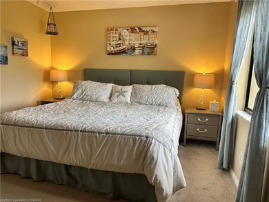 Step into a tastefully, fully furnished 2nd-floor condominium in - photo 13