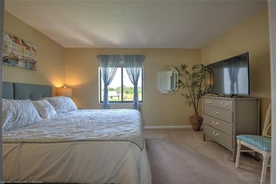 Step into a tastefully, fully furnished 2nd-floor condominium in - photo 14