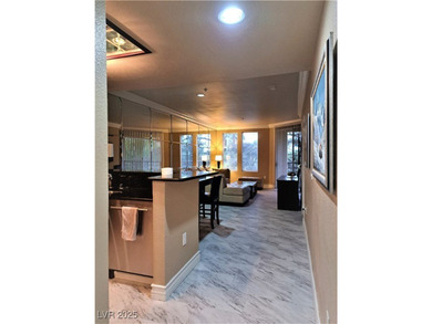 FULLY FURNISHED CONDO! Resort Style living located 1-1/2 block