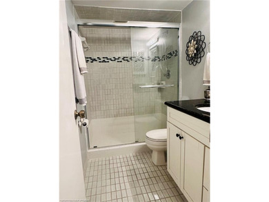 Step into a tastefully, fully furnished 2nd-floor condominium in - photo 23