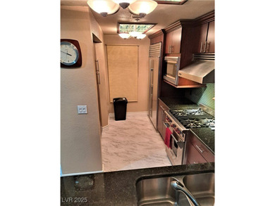 FULLY FURNISHED CONDO! Resort Style living located 1-1/2 block