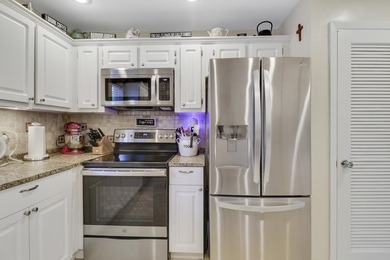 Only available ground-floor end unit in the sought-after - photo 8
