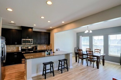 Welcome home to 725 Ethridge Point, a stunning residence nestled - photo 5