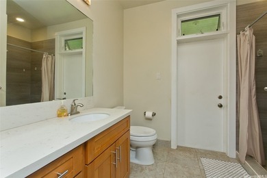 Nestled in the lush and prestigious Manoa Valley, this expansive - photo 12