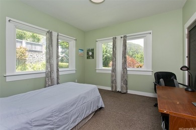 Nestled in the lush and prestigious Manoa Valley, this expansive - photo 13