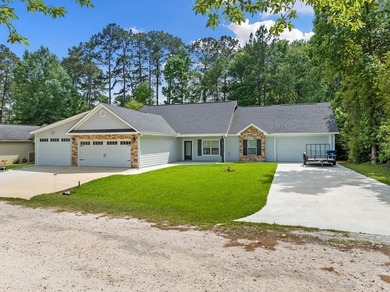 REDUCED! Make your move to Rayburn Country! This versatile home - photo 27