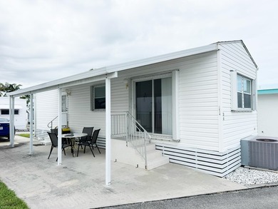 This great 1 bed, 1 bath unit at Briny Breezes offer 39 shares - photo 1