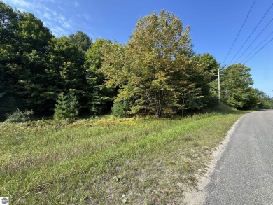 This 0.81-acre parcel features mature hardwoods, open area near