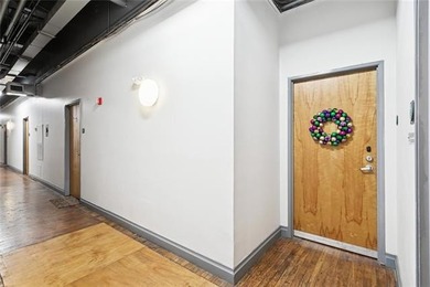 This rare, corner, ground-floor 2-bedroom, 2-bath unit in the