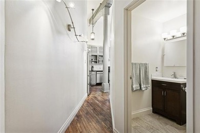 This rare, corner, ground-floor 2-bedroom, 2-bath unit in the