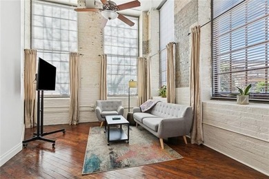 This rare, corner, ground-floor 2-bedroom, 2-bath unit in the