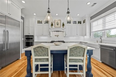 Enjoy refined living in this exceptional home located in the - photo 24