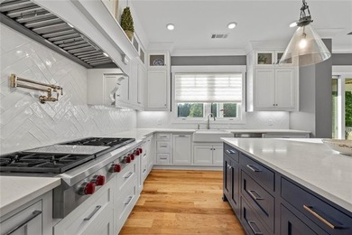 Enjoy refined living in this exceptional home located in the - photo 28