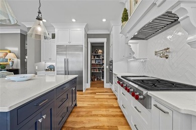 Enjoy refined living in this exceptional home located in the - photo 30