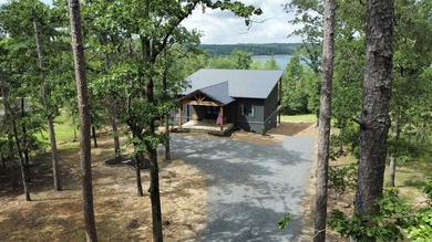 Don't wait to checkout this Stunning Custom Built Lakefront Home - photo 2