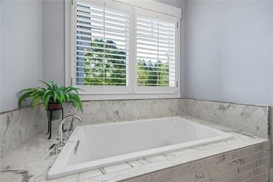 Enjoy refined living in this exceptional home located in the - photo 37