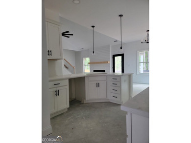 New construction home with 4 bedrooms and 2 bathrooms. Double - photo 6