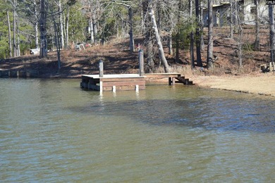 Remarkable waterfront home in a cove with lakefront views. - photo 12
