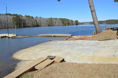 Remarkable waterfront home in a cove with lakefront views. - photo 13