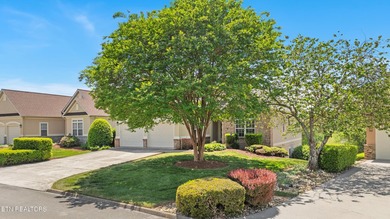 Welcome to this beautiful 'lock-and-leave' home in the - photo 3