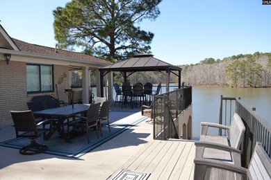 Remarkable waterfront home in a cove with lakefront views. - photo 15