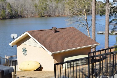 Remarkable waterfront home in a cove with lakefront views. - photo 18