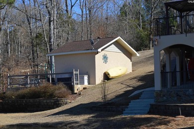 Remarkable waterfront home in a cove with lakefront views. - photo 19